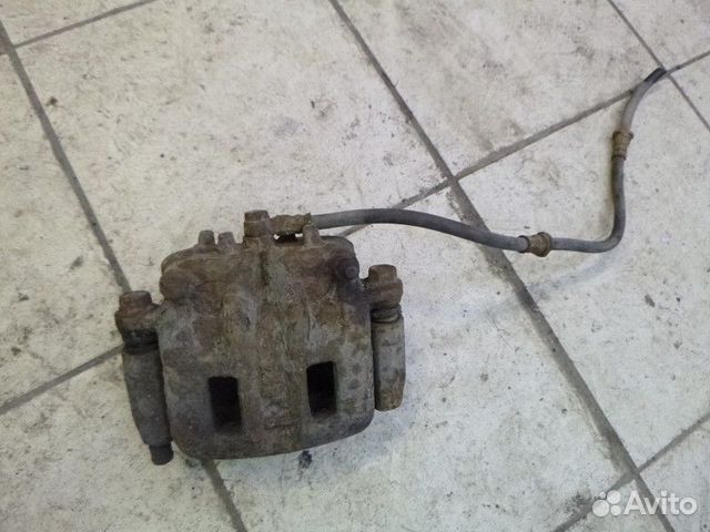 Суппорт передний правый mitsubishi pajero/montero