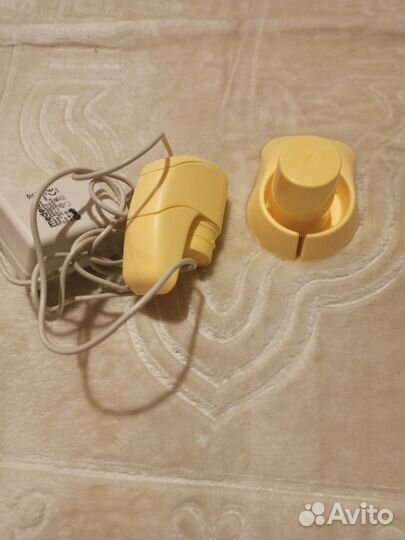 Молокоотсос medela электрический