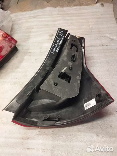 Фонарь левый Sandero 1 новый оригинал 8200734825