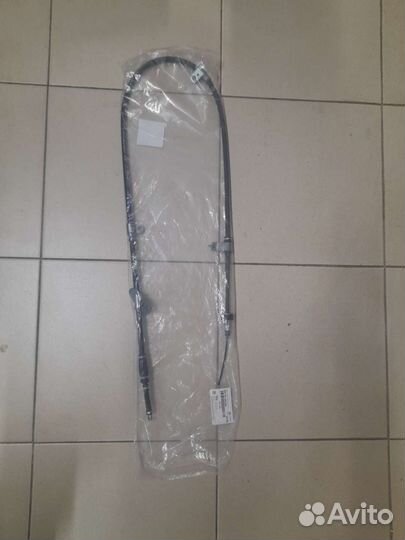 Трос стояночного тормоза 597703w200