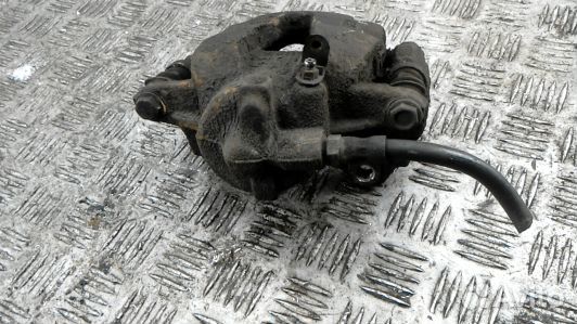 Суппорт тормозной передний правый opel corsa D (83