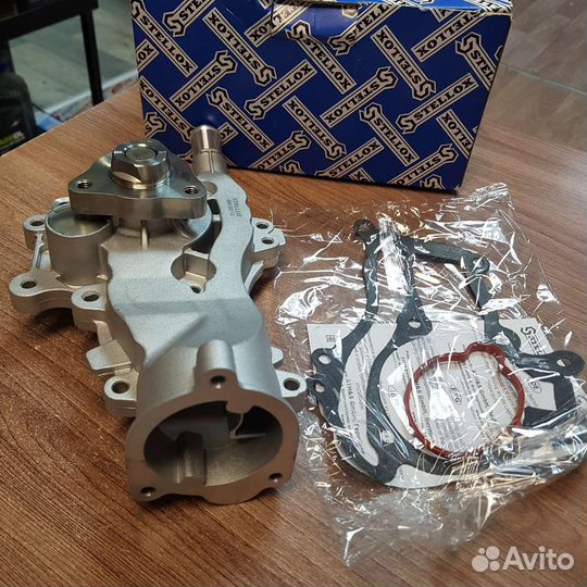 Насос водяной Opel Astra J 1.4, Corsa D