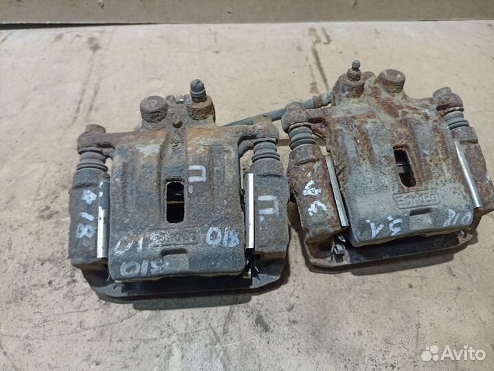 Суппорт тормозной задний Mazda CX-7 I рестайлинг