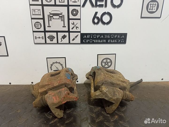 Суппорт тормозной передний Kia Spectra 2001-2011