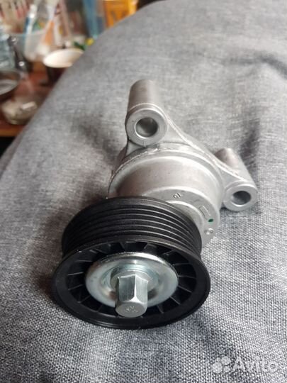 Натяжитель ремня 12609719