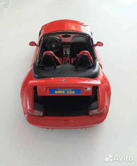 Модель машины BMW -M roadster(1996) 1/18 Bburago