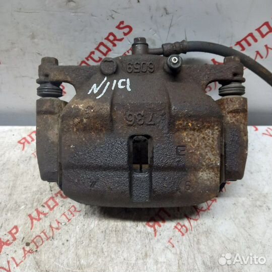 Суппорт тормозной передний левый Nissan Qashqai