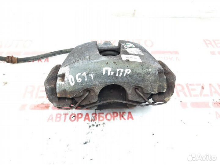 Суппорт тормозной передний правый Mazda Mazda3 BK