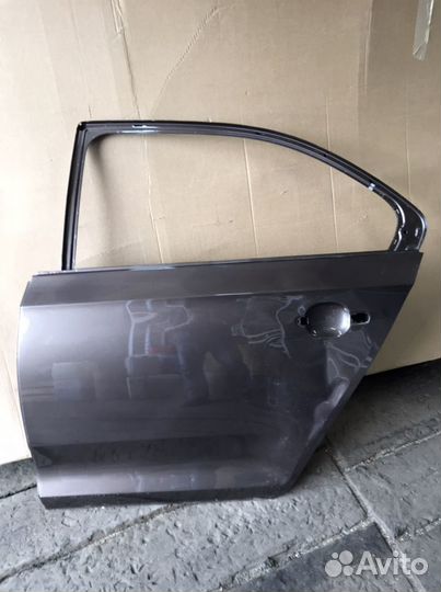Дверь задняя левая Skoda Rapid