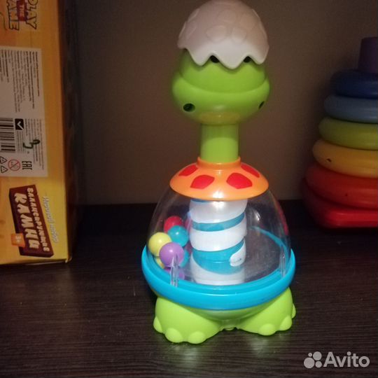 Игрушка юла chicco динозаврик