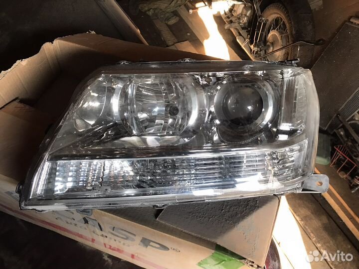 Фара левая Grand Vitara