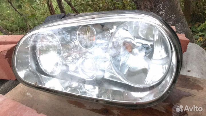 Фара левая golf 4 hella