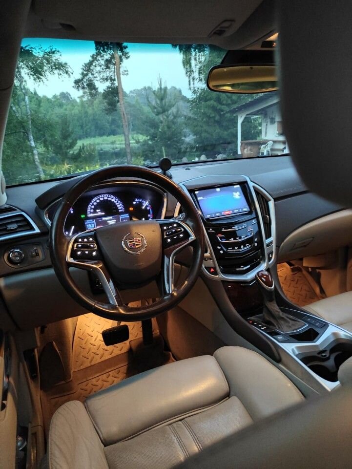 Cadillac SRX: фото владельца
