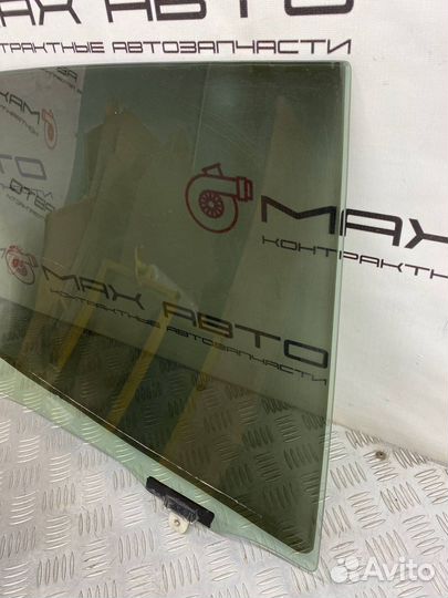 Б/У стекло двери задний левый Toyota Duet M110A