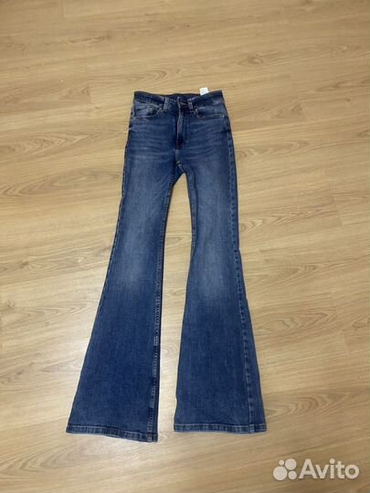 Джинсы клеш