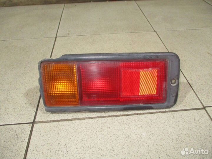 Фонарь задний в бампер правый Mitsubishi Pajero 2