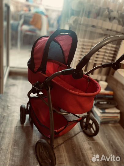 Игрушечная коляска для кукол