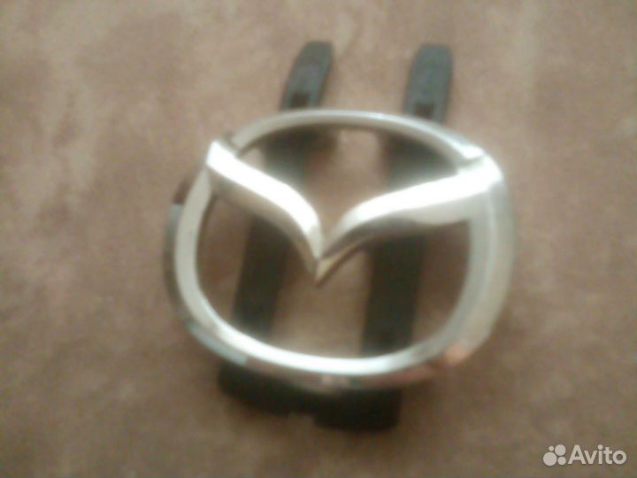 Значок на руль mazda