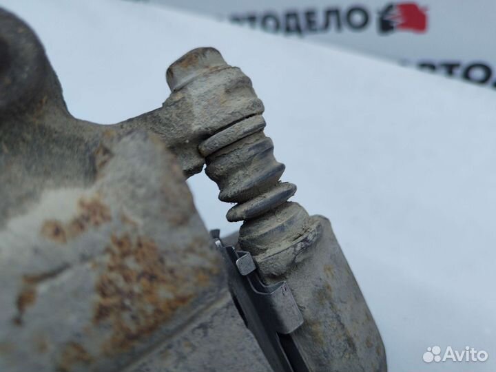 Суппорт тормозной левый Nissan Lucino N15 1995 г