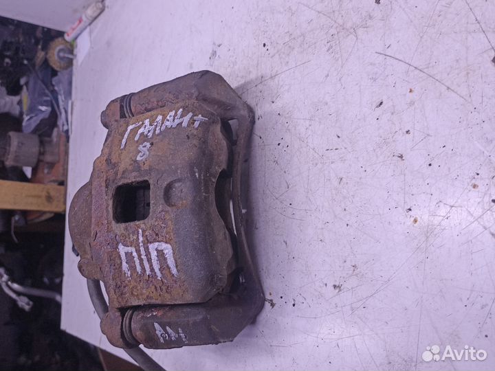 Суппорт тормозной передний п mitsubishi galant 8
