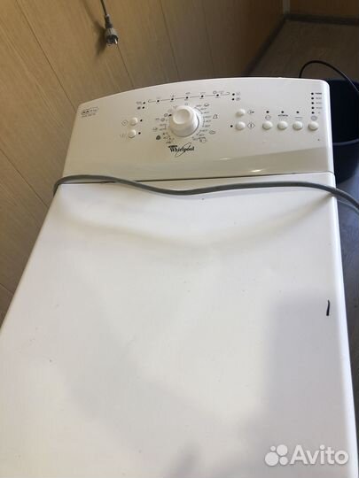 Стиральная машинка с вертикальной загрузкой