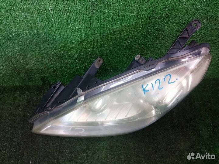 Фара левая Opel Zafira B (2005-2012)