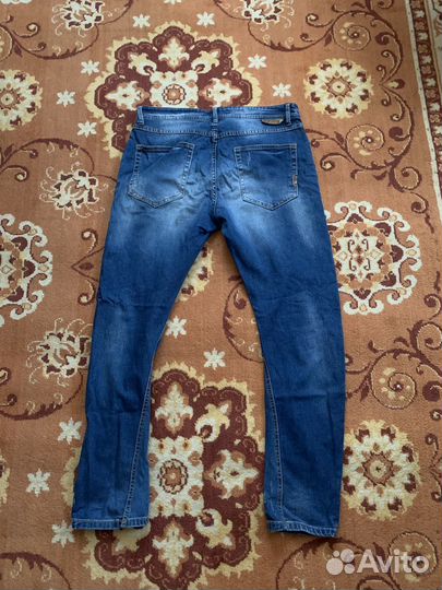 Джинсы с дырками мужские