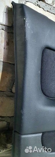 Обшивка двери передней левой Opel Astra G