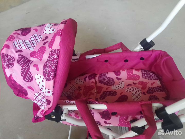 Детская игрушечная коляска