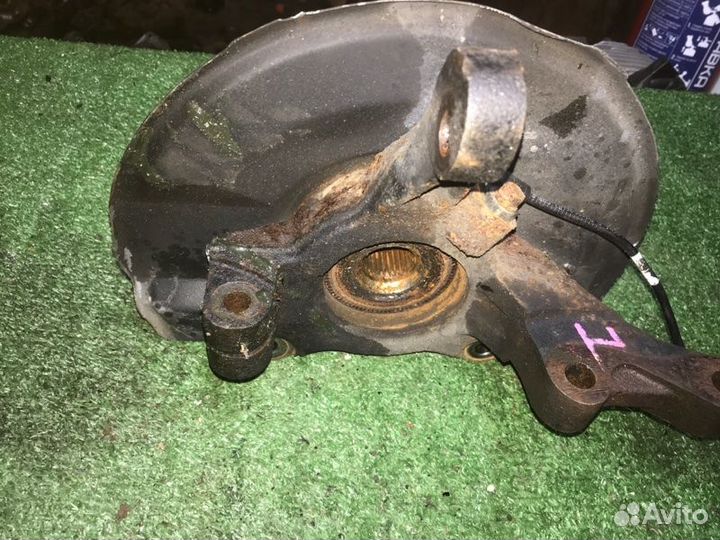 Кулак передний левый Mitsubishi Lancer X CY4A 4B11