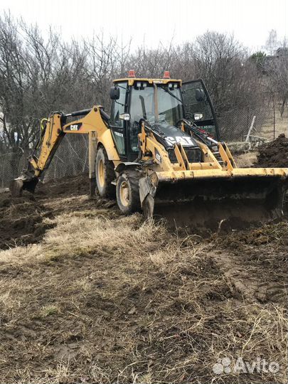 Экскаватор погрузчик в Симферополе с гидромолотом