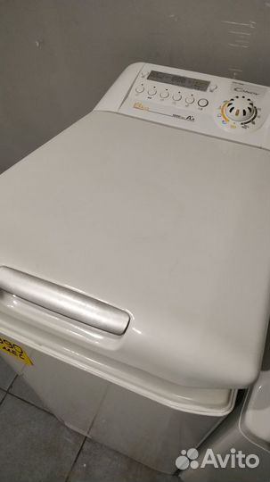 Стиральная машина вертикального типа загрузки