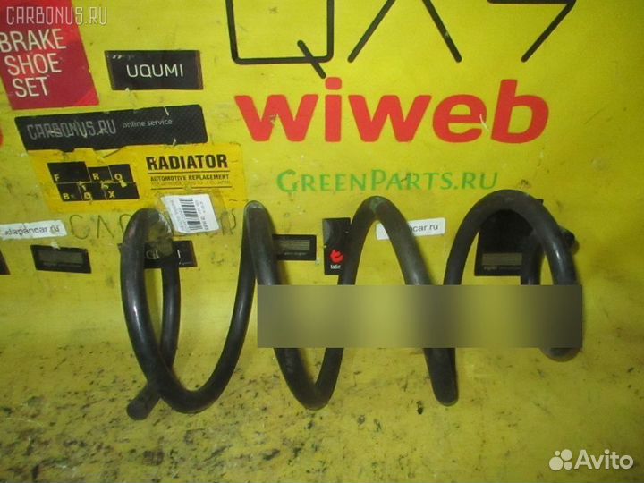 Пружина на Nissan Note E12 HR12DDR