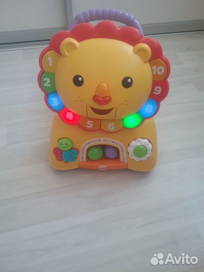 Машинка-ходунки-толокар лев Fisher Price