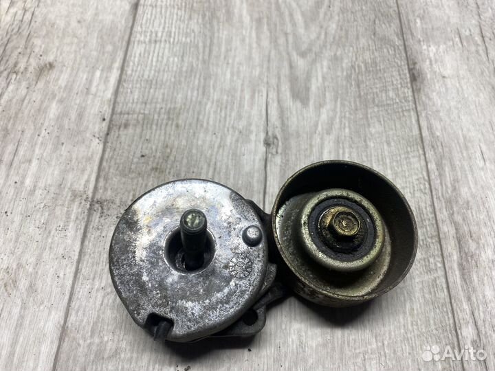 Натяжитель приводного ремня nissan Qashqai X-Trail