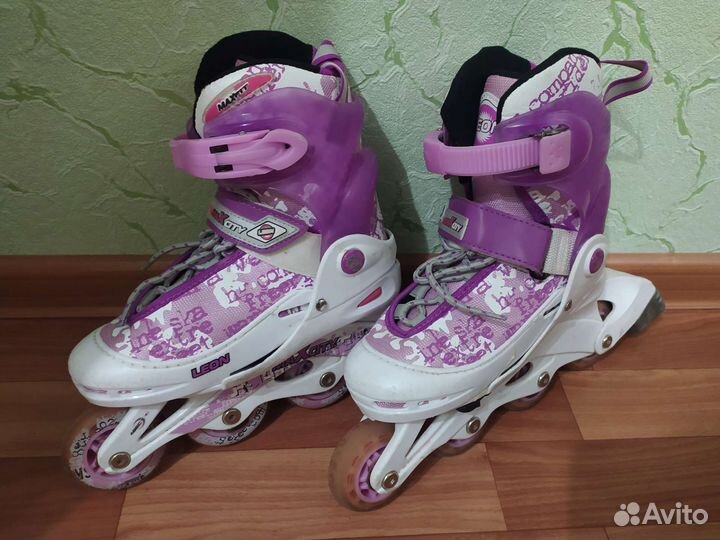 Роликовые коньки