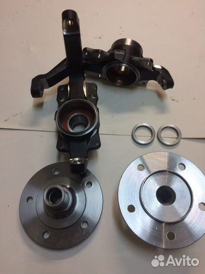 Кулак поворотный 21214 волгаавтопром. Усиленный поворотный кулак нива 21213. Усиленный ступичный узел шевроле нива волгаавтопром 2123. Поворотный кулак нива 21214. ).