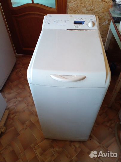 Стиральная машина с вертикальной загрузкой