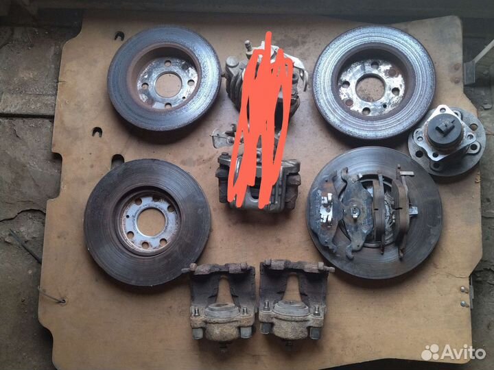 Суппорта передние и диски Опель Астра G