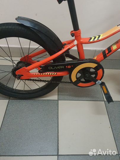 Велосипед детский оранжевого цвета