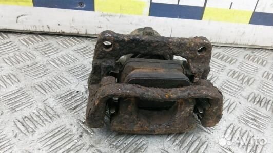 Суппорт тормозной задний левый land rover freeland