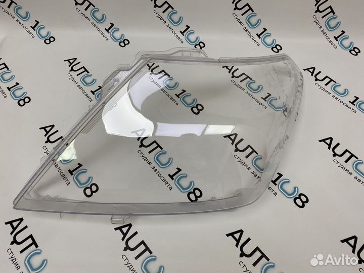 Стекло фары Nissan Patrol 2014-2021 левое 0130