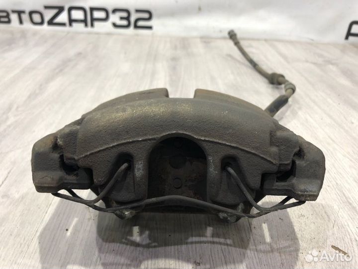 Суппорт тормозной передний правый Volkswagen Polo