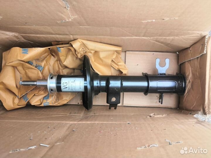 Стойка амортизатора передняя Aveo T200, T250