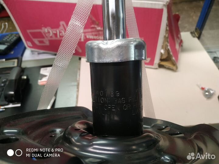 Амортизатор передний левый Nissan X-Trail T32