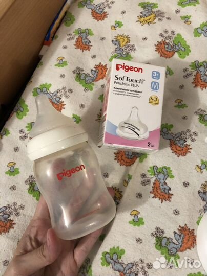 Молокоотсос ручной (+ 4 пакета для молока)