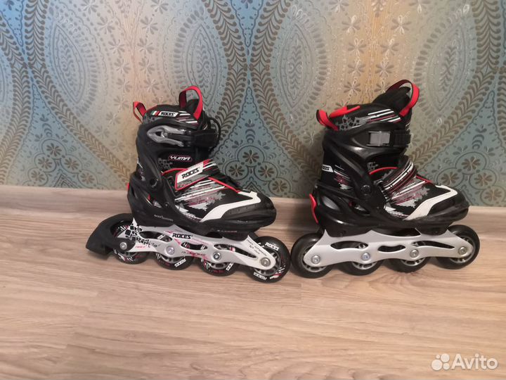 Роликовые коньки