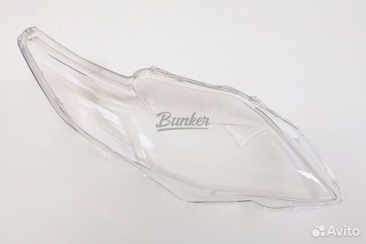 Стекло фары Toyota Corolla E150 дорестайлинг