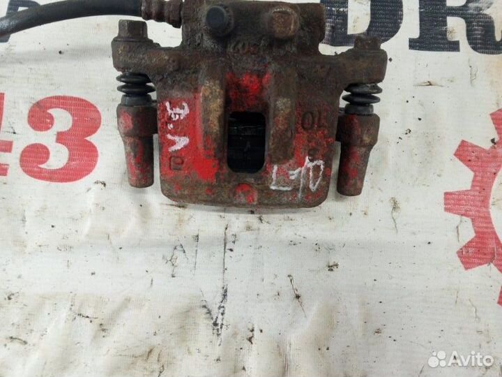 Суппорт задний левый Mitsubishi Lancer 10 седан