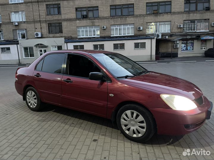 Mitsubishi Lancer 1.3 МТ, 2006, 180 000 км